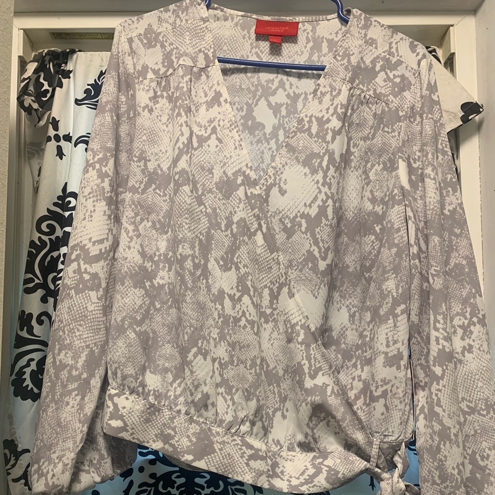 Brand new with tags! Jennifer Lopez long sleeved, side tie blouse.